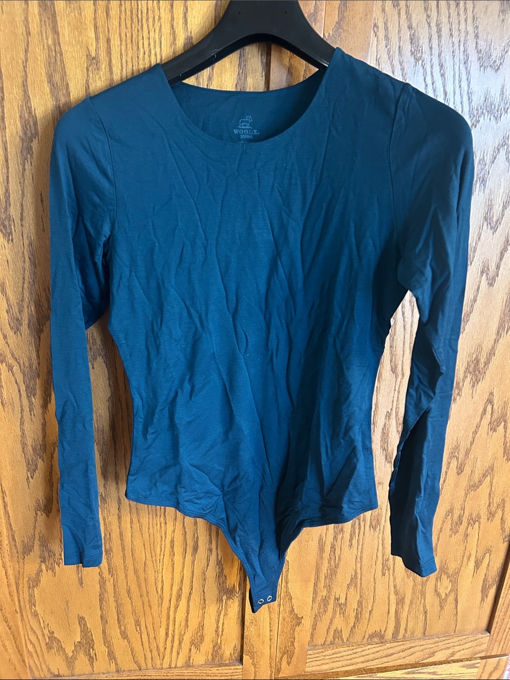 Woolx Long-Sleeve Real Teal Bodysuit.